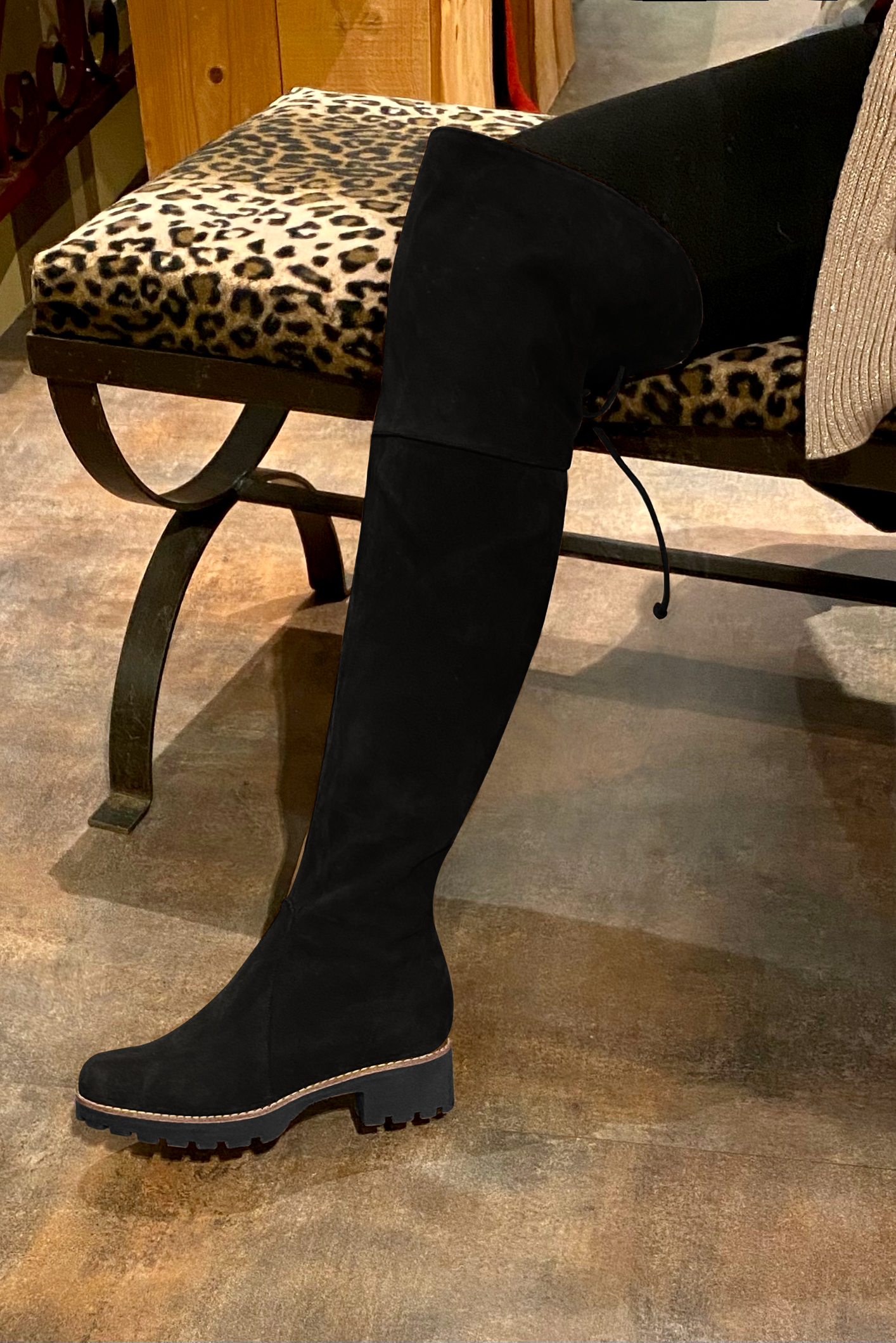 Matt black women's leather thigh-high boots. Round toe. Low rubber soles. Made to measure. Worn view - Florence KOOIJMAN